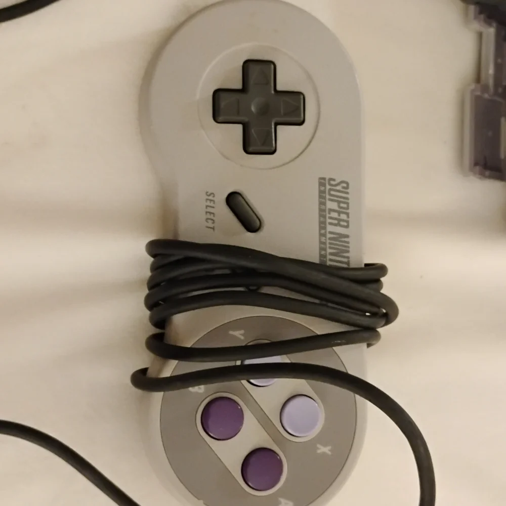Nintendo Console with Gray and Purple Design